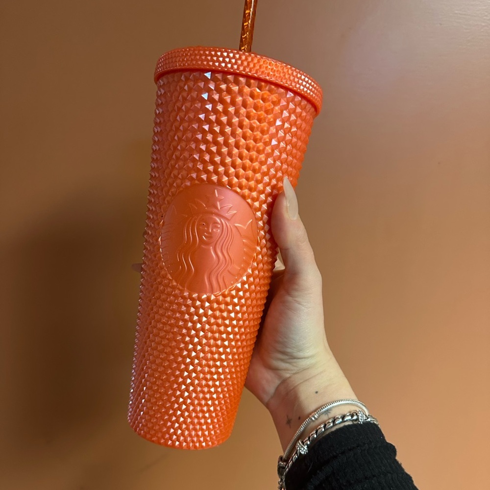 Orange venti Starbucks tumbler